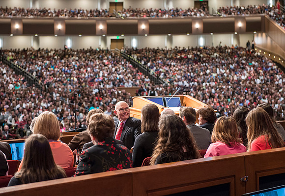 Elder Oaks looks back and smiles at the choir. photo by Michael Lewis