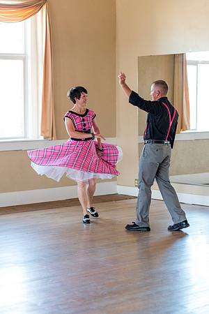 Adam and Jennifer Anderson dancing at the Woodman Ballroom for Online Recruiting marketing material.