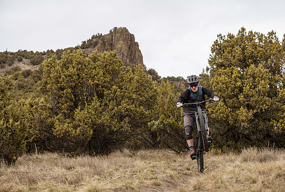 James riding gravel roads and trails on a bicycle during the COVID-19 quarantine period.