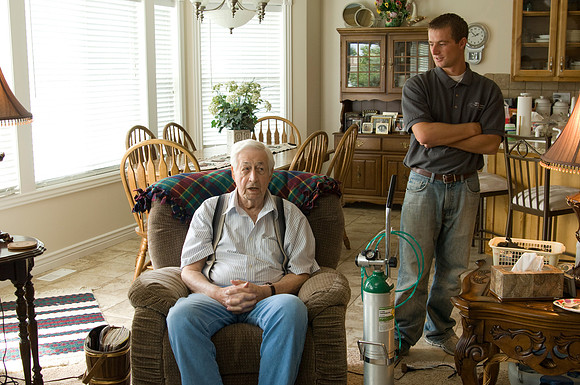 Casey Schanz, an intern with Teton Pharmacy works with elderly people in need of oxygen. Photos for an Internship brochere.  2007