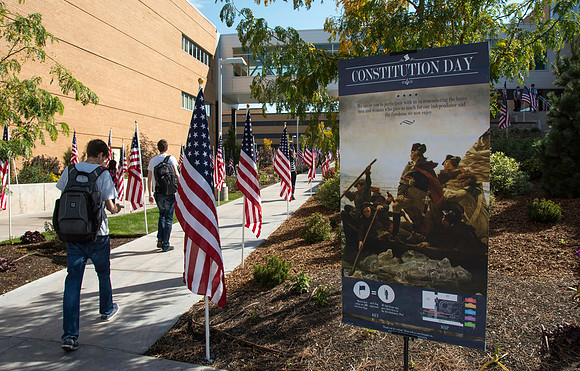 Flags on display in the Central Quad celebrate Constitution Day. "Remembering the brave men and women who gave so much for our Independance and the freedoms we now enjoy."