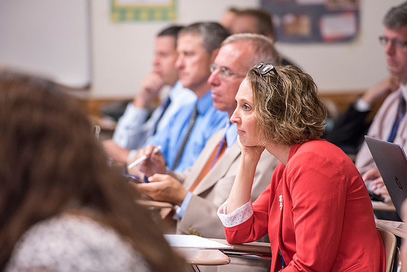 Faculty members come together in preparation of the new school year.