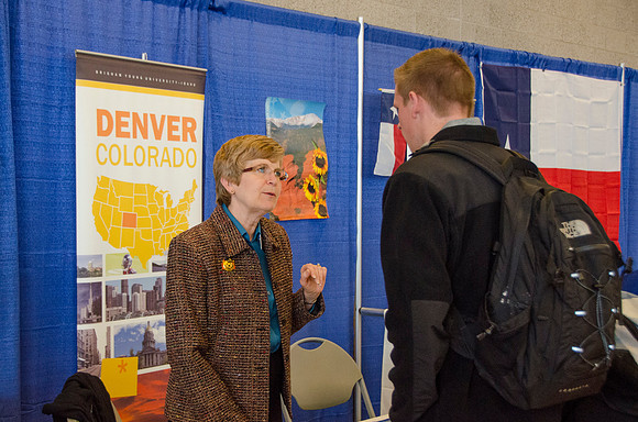 BYU-Idaho students speak to representatives from colleges or companies from their field of study at a career fair held in the I-Center gym