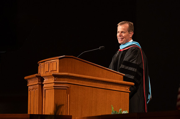 David R. Peck, Dean of the College of Education and Human Development, welcomes graduates at convocation