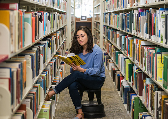 BYU-Idaho student, Karen Torres in the McKay Library. Photo for Admissions Viewbook.