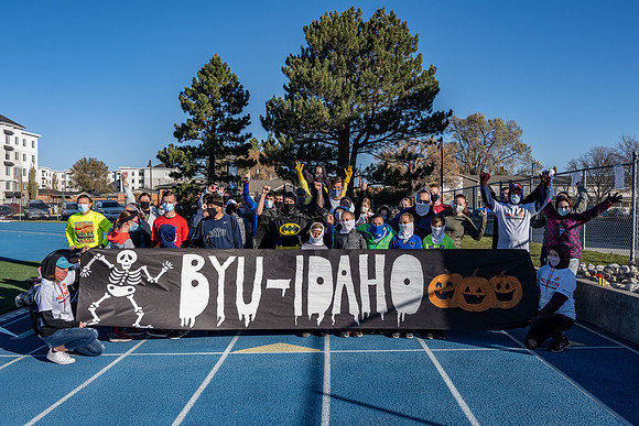 BYU-Idaho employees and their families enjoy a beautiful fall day at the stadium track.
