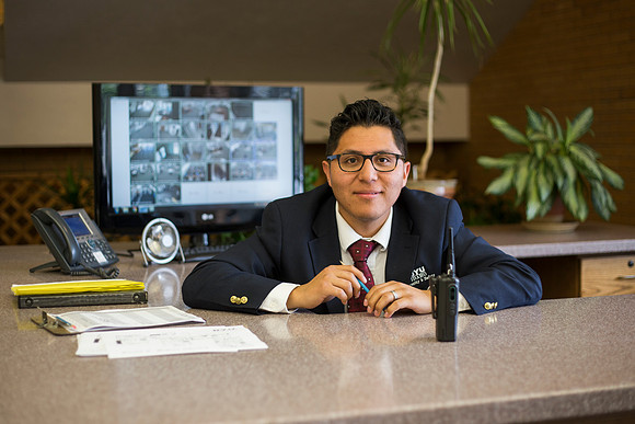 Students prepare for their classes, in the McKay Library.