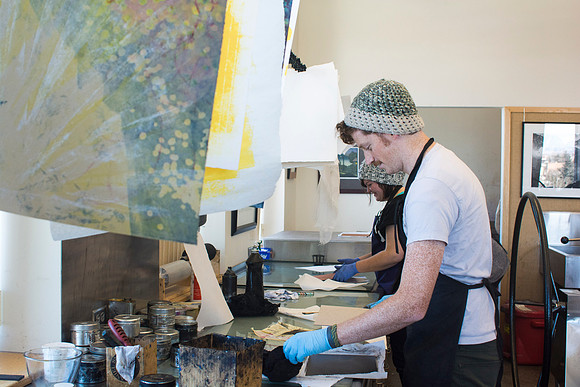 Art students at work in their hands-on print making class.