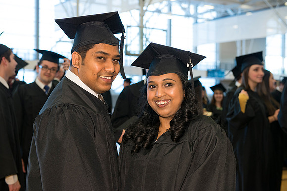 Graduates gather and march in during the processional for April 2014 Graduation ceremonies in the BYU-Idaho Center.
