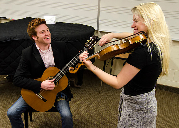 Students practice their music piece for their upcoming performance.