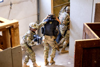 ROTC practices military tatics in an Advantage Airsoft facility.