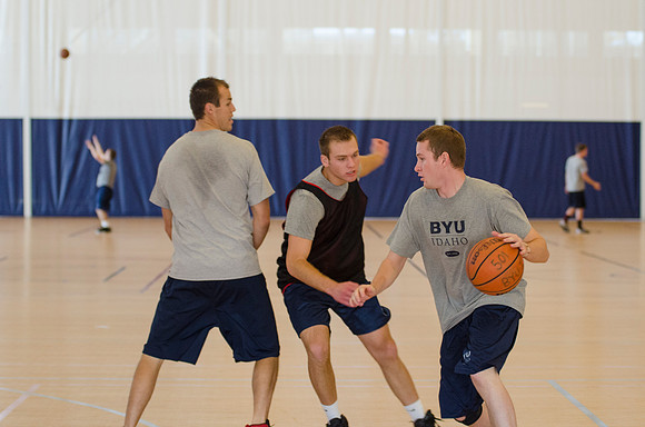 BYU-Idaho students playing basketball at the I-Center on campus