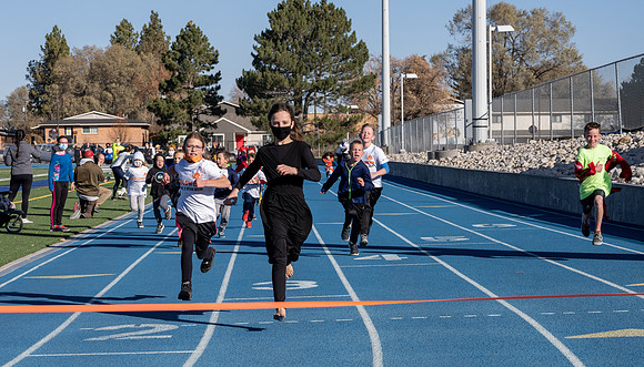 BYU-Idaho employees and their families enjoy a beautiful fall day at the stadium track.