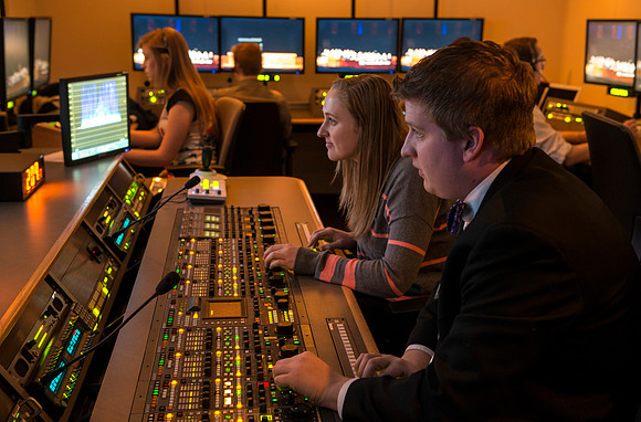 Behind the scenes of devotional: In the AV Camera Control room students run five mounted cameras in the BYU-I Center auditorium.
