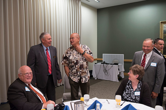 Alumni of the class of 1964 and earlier gather and honor the Briggs for their service.