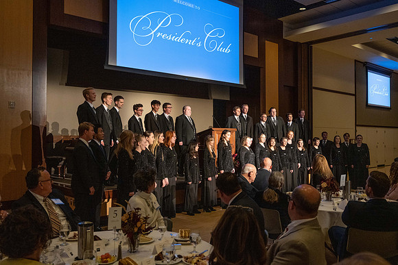 President's Club members enjoy an evening of socializing, musical entertainment and wonderful food in the Manwaring Center Ballroom.