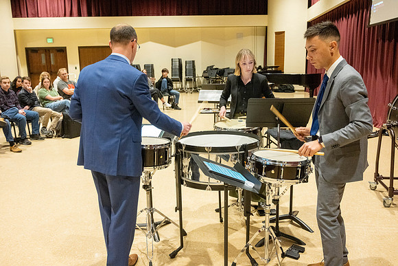 Members of the United States Marine Band work with students in a Masters class.