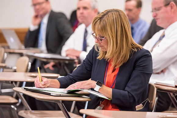 Faculty members come together in preparation of the new school year.
