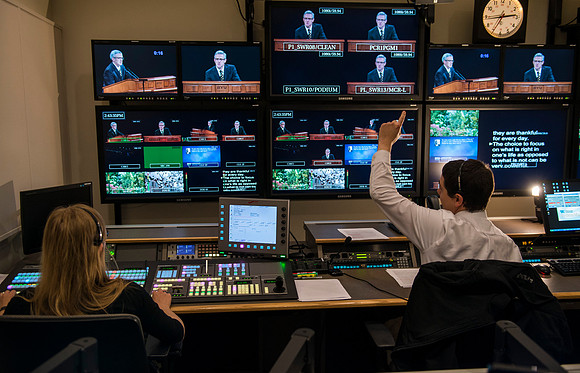 Behind the scenes of devotional in the AV_Control Room. Mike Jeffs directs the camera's during devotional.