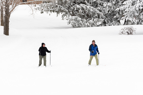 Volunteers and Community members enjoying Winter Fest at the Teton Lakes Golf Course.