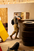 ROTC practices military tatics in an Advantage Airsoft facility.