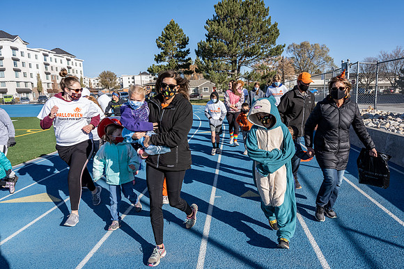 BYU-Idaho employees and their families enjoy a beautiful fall day at the stadium track.