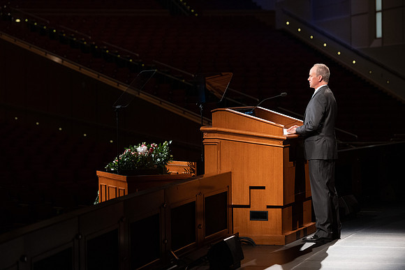 Robert Tueller of the Music Department records his devotional talk.