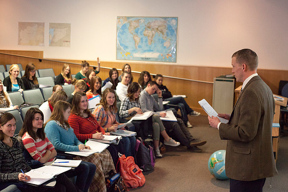 Brother Michael Madsen teaches his early morning Geography For Elementary Teachers class in the Ricks Building.