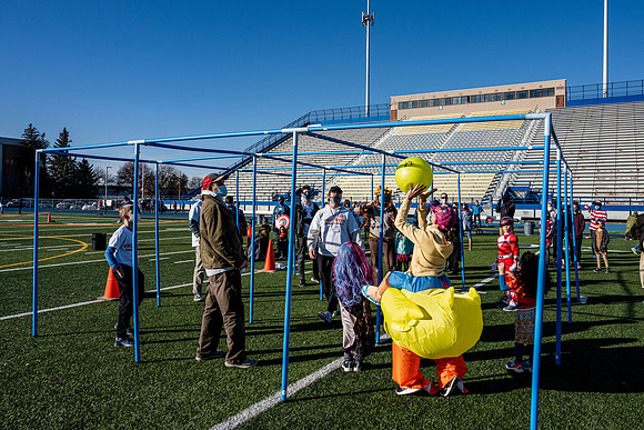 BYU-Idaho employees and their families enjoy a beautiful fall day at the stadium track.