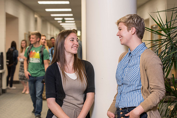 Information Technology students pose on campus for the department webpage.