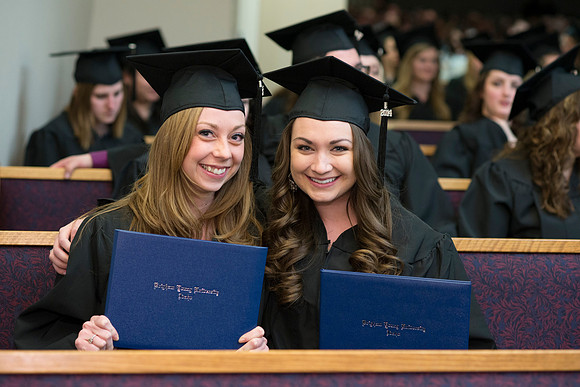 Students of the College of Human Development receive their diploma cover. Photo by Leanna Davidson