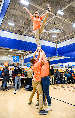 As part of the Get Connected experience students have the opportunity to serve by either writing notes to military members, making fleece blankets, making plastic yarn for mattresses, and more.