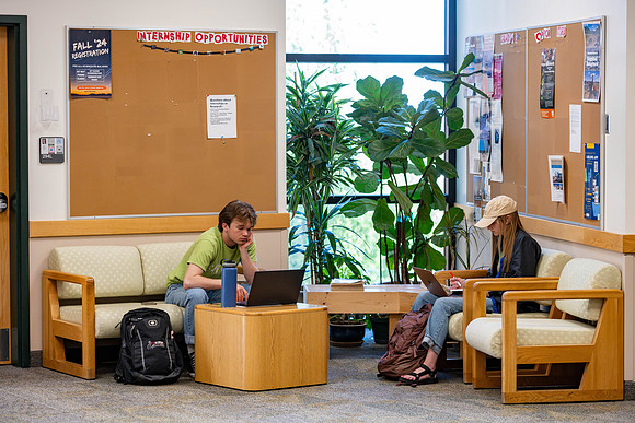 Students studying in the Benson Building.