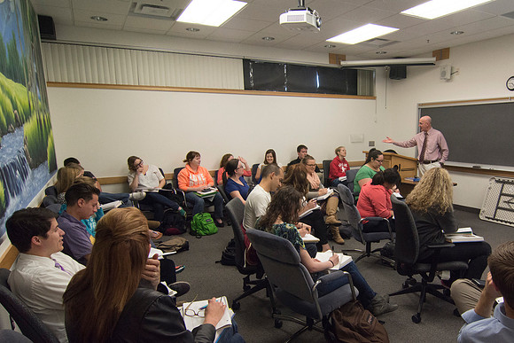 Students listen to Brother Clay teach in one of most relaxing classrooms on campus.