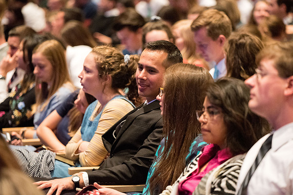 Students gathering before the devotional.