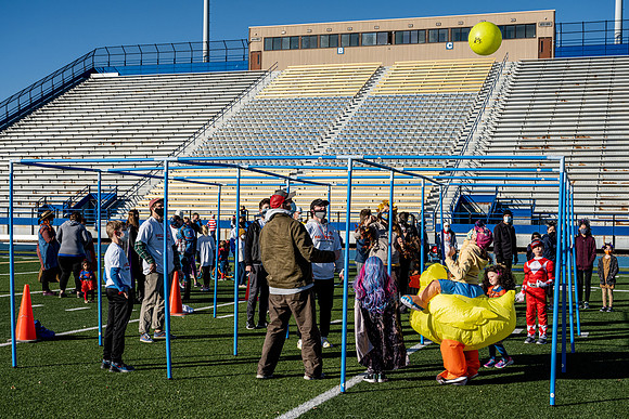 BYU-Idaho employees and their families enjoy a beautiful fall day at the stadium track.