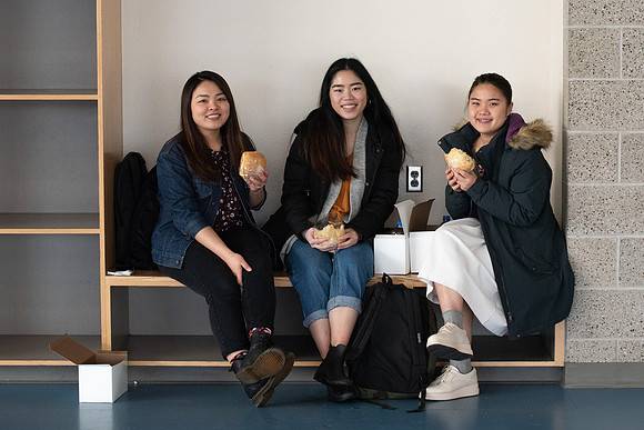 Students pick up their $2 box lunch after devotional for the first time.