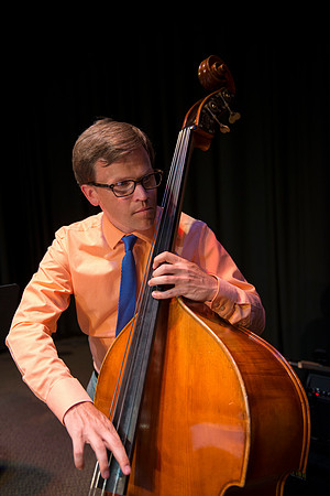 Aaron Miller on upright bass.