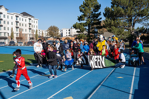 BYU-Idaho employees and their families enjoy a beautiful fall day at the stadium track.