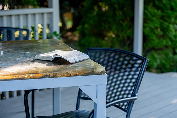 The Book of Mormon on a table in the Ricks Gardens