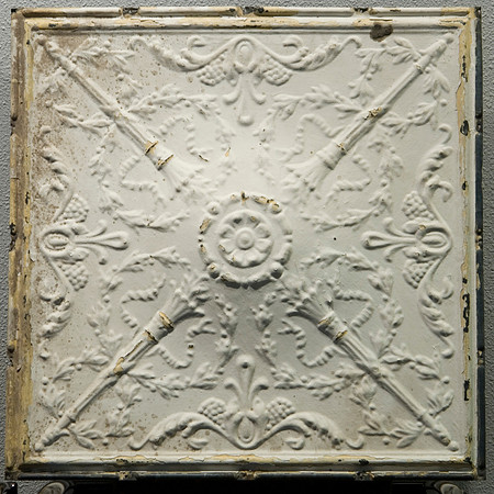 Tin ceiling tile out of the old Spori Building.