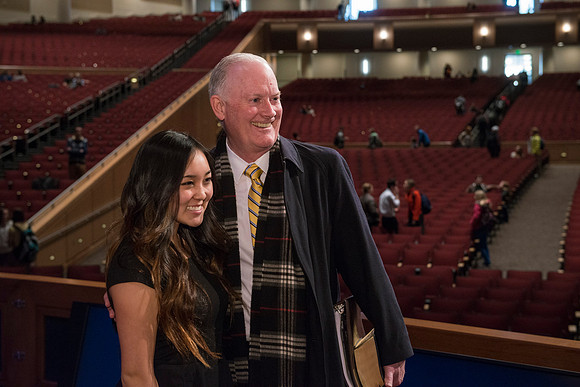 President Clark takes a moment to have his picture taken with a student.