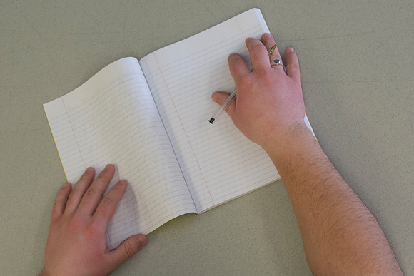 Students participate in the Writing Workshop to receive critiques on their work.