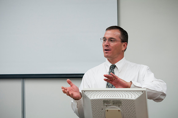 Students give presentations in Rick Hirschi's Economics class.