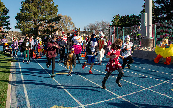 BYU-Idaho employees and their families enjoy a beautiful fall day at the stadium track.