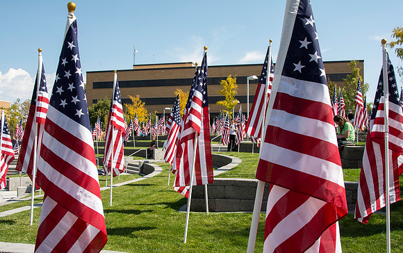 Flags on display in the Central Quad celebrate Constitution Day. "Remembering the brave men and women who gave so much for our Independance and the freedoms we now enjoy."