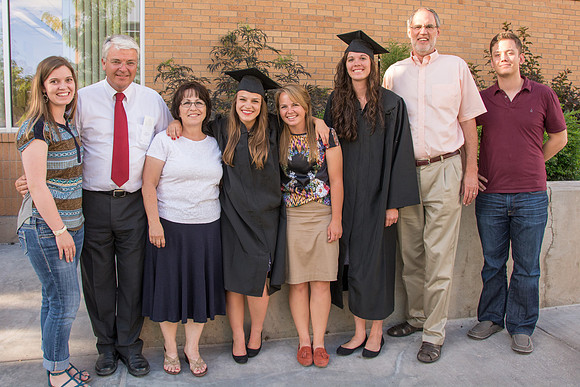 Faculty, family and graduates around campus after the commencement ceremony.