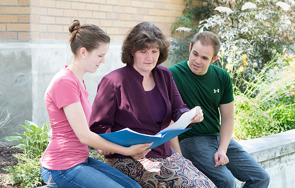 Sister Brooke McKenna teaches students in a communication class.