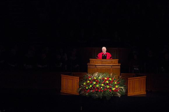 President Kim B. Clark addresses students, faculty and graduates during the 2014 Fall Graduation in the I-Center.