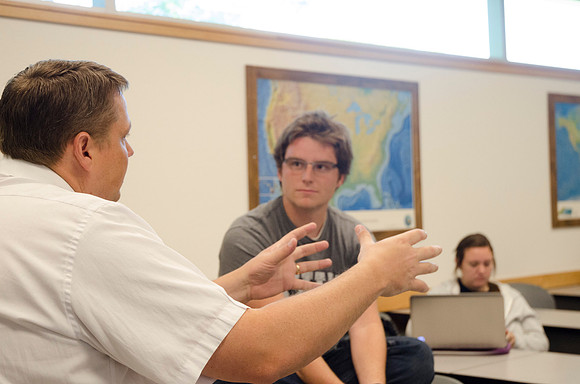 Matt Miles consults with a student one on one.